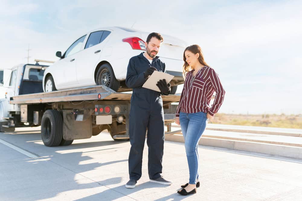 Towing worker with lady